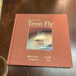Rare collector’s edition book on trout fly fishing, featuring illustrated techniques and history.