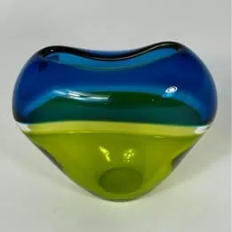 Beautiful mid-century modern hand-blown art glass vase in striking colors and patterns.